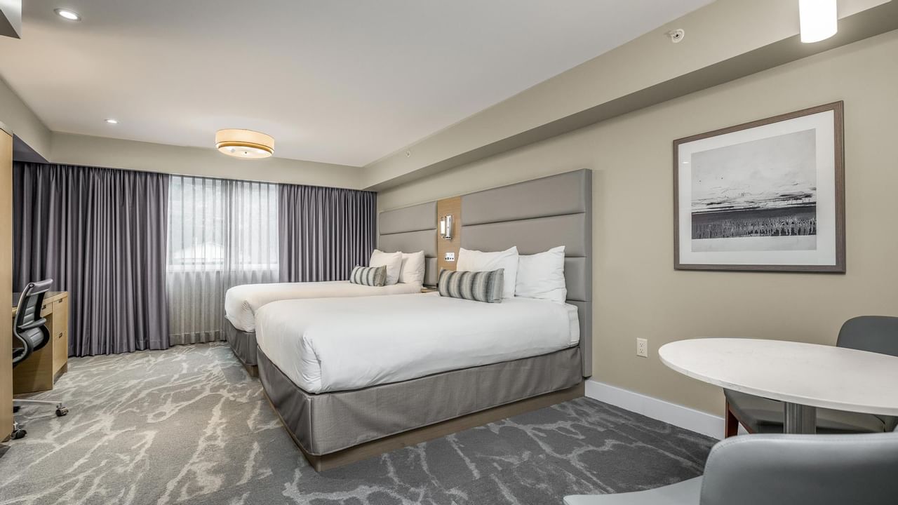 View of two queen beds in our Coast Accessible Two Queens Bedroom