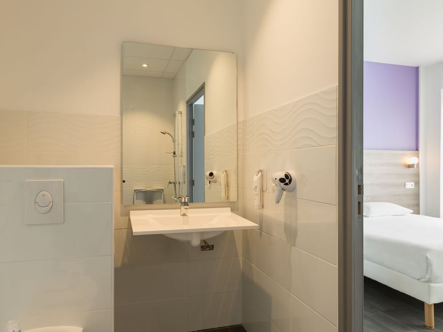 Bathroom interior in bedrooms at Hotel Nevers Centre Gare
