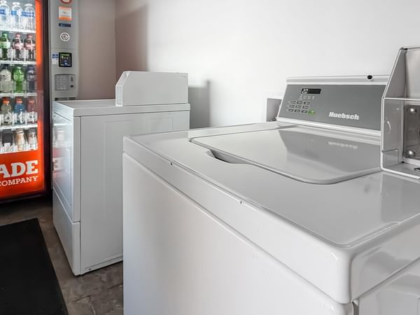 Coin-operated laundry machine.