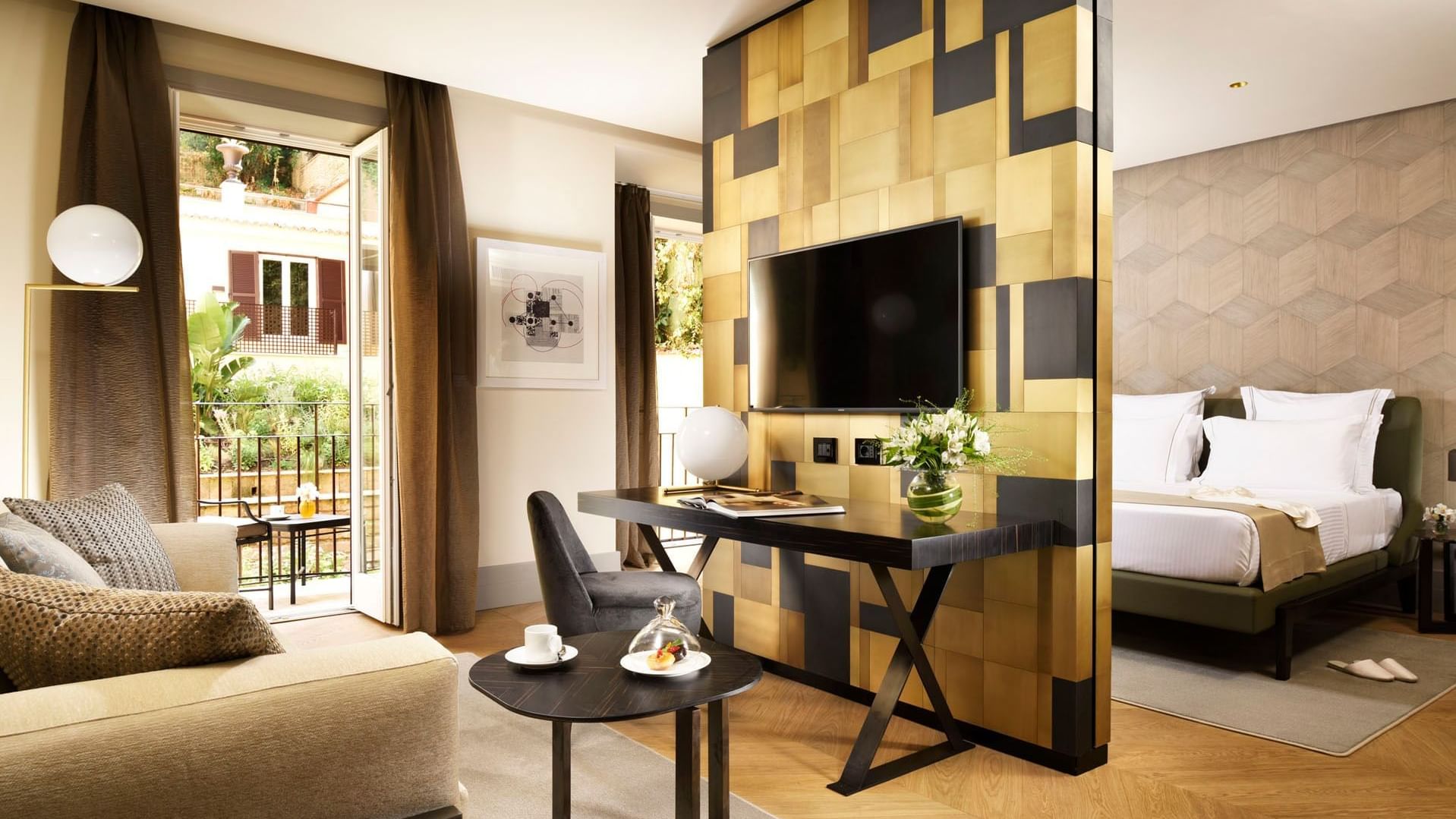 Seating in the living room with an outdoor view in the Deluxe Suite at Margutta 19