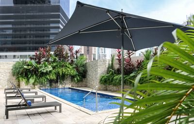 pool with lounge chairs