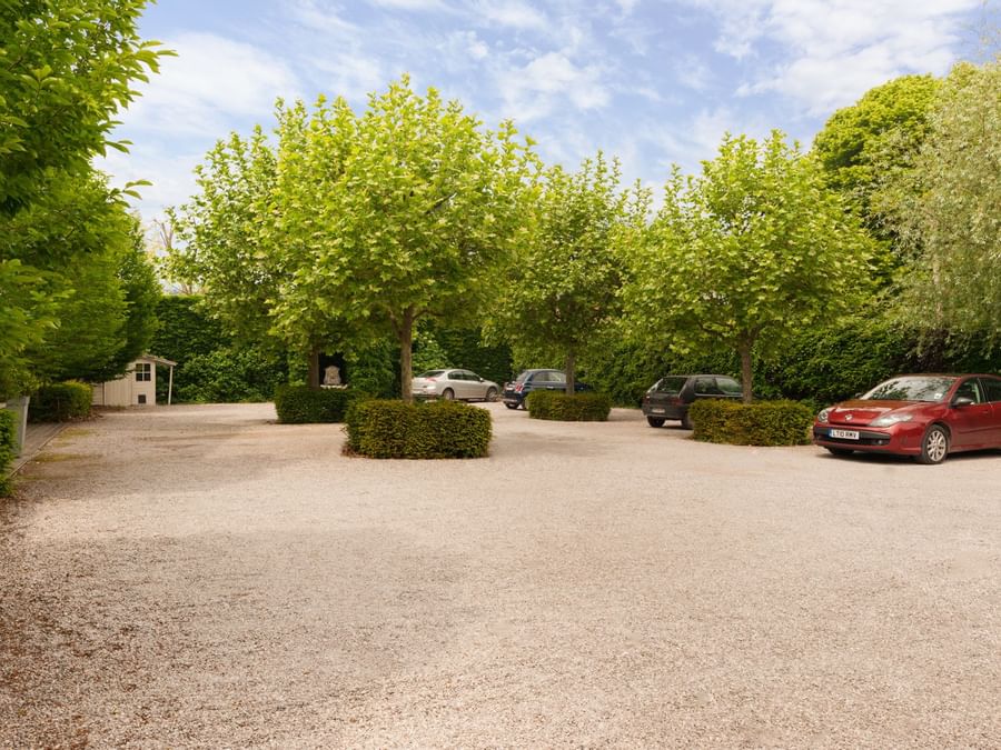 Exterior view of the hotel car park at Les Jardins d'Ulysse