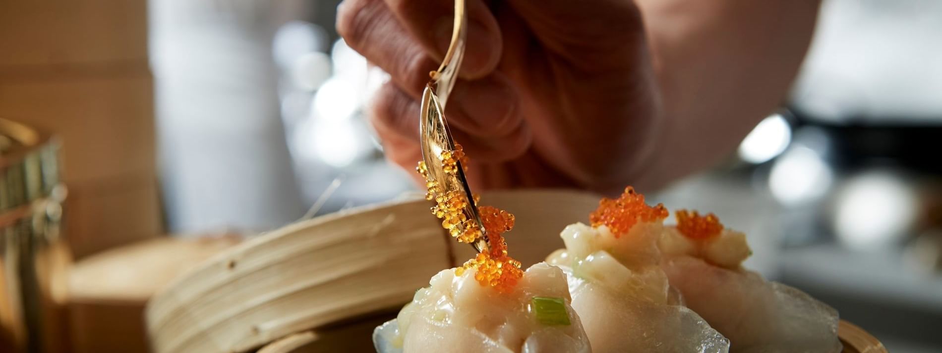 Garnishing dish in Silks Restaurant at Crown Hotel Melbourne