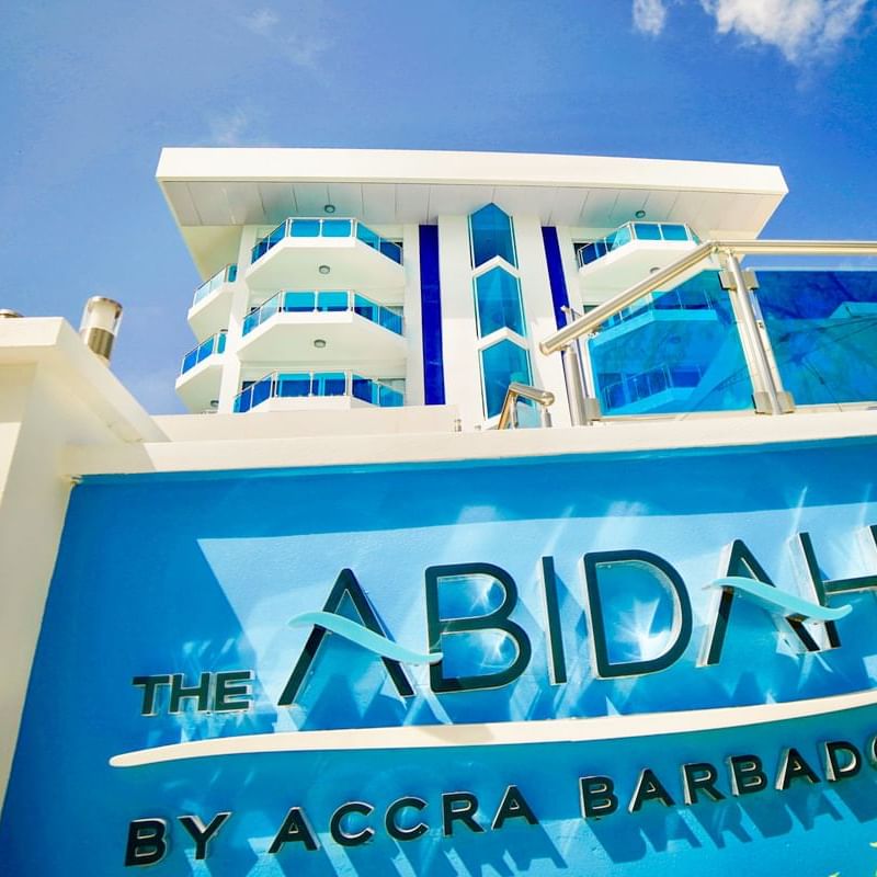 Hotel sign by the entrance of The Abidah by Accra Barbados