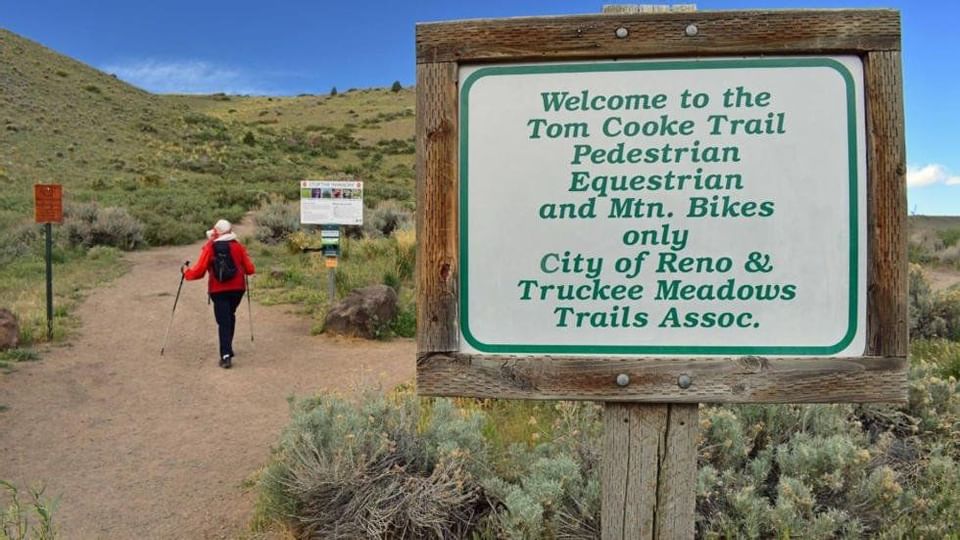Welcome sign of Tom Cooke Trail near Legacy Vacation Resorts