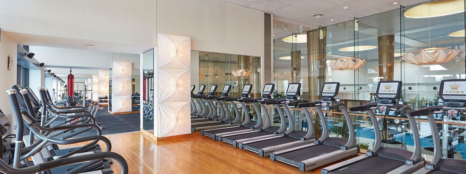 Treadmills in the fitness center at Crown Hotels Group