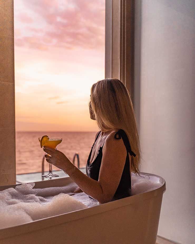 Enjoy the view in our indoor bathtub while sipping on drinks - Lexis Hibiscus PD