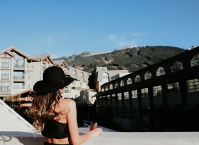 Young lady enjoying a mountainscape view at Adara Hotel