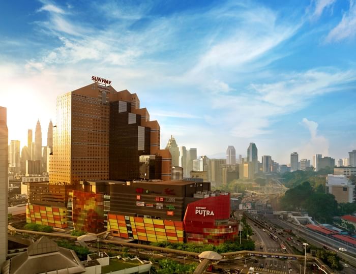 High-angle view of Sunway Putra Hotel with city near Sunway Velocity Hotel