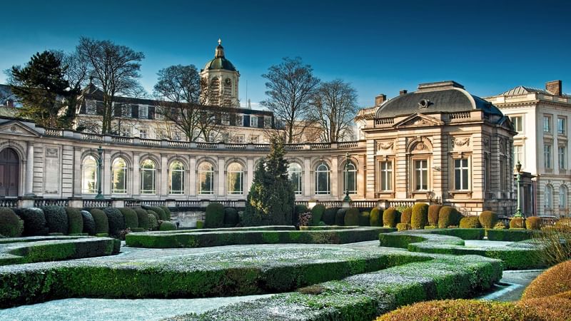 Garden with geometric hedges in front of a Royal Palace near Warwick Brussels