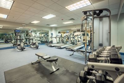 Close-up of gym equipment in a fitness center at Kinzie Hotel