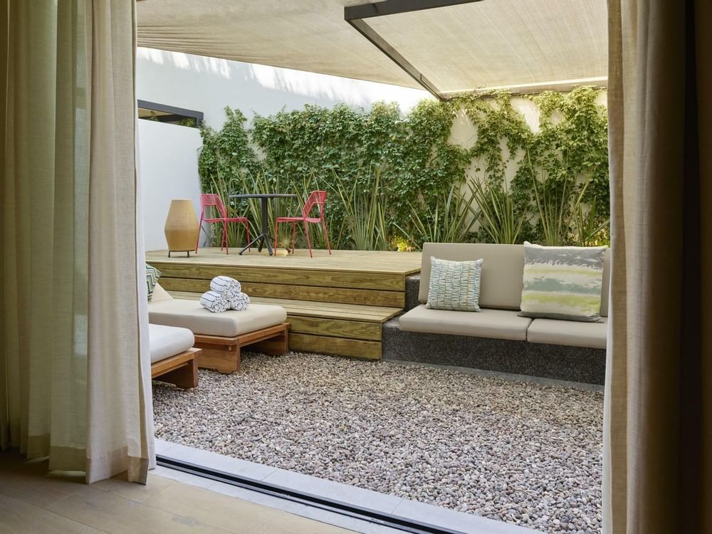Zen Suite with an outdoor patio at Live Aqua Beach Resort