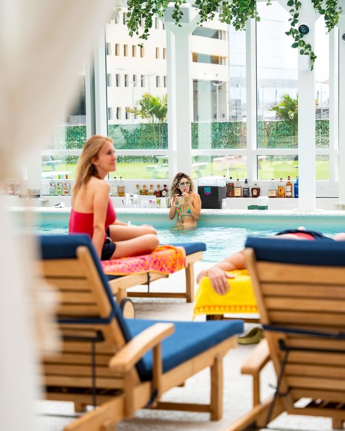 Women enjoying in Swim-Up Bar at Island Waterpark at Showboat