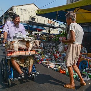 penang locals are selling stuffs on the roadside