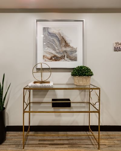 Close-up of a console table & a wall painting at Berkeley Shore