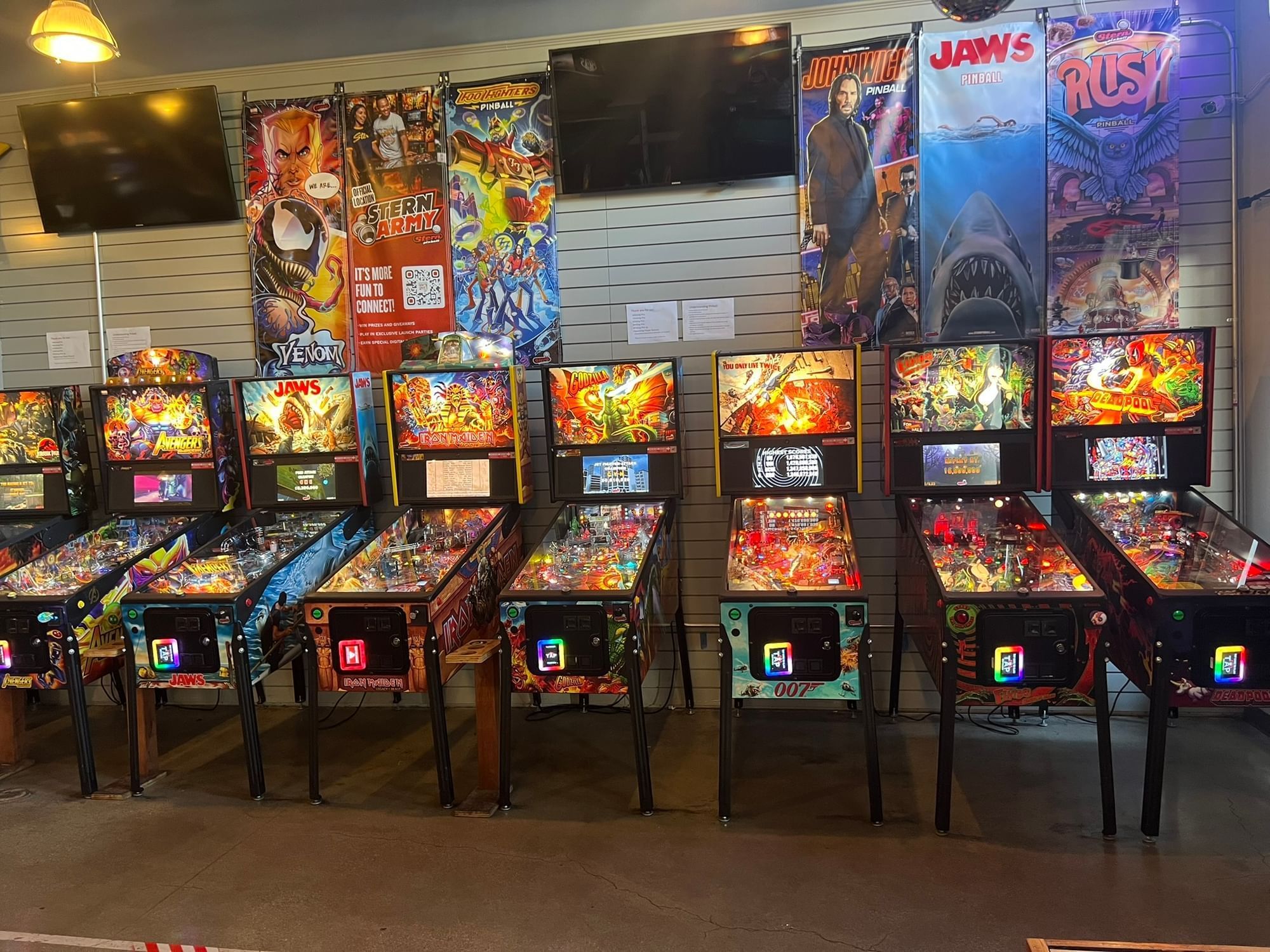 BA Start a row of different pin ball machines 