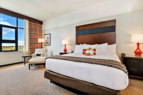 King bed & furniture in a room at Hotel 43