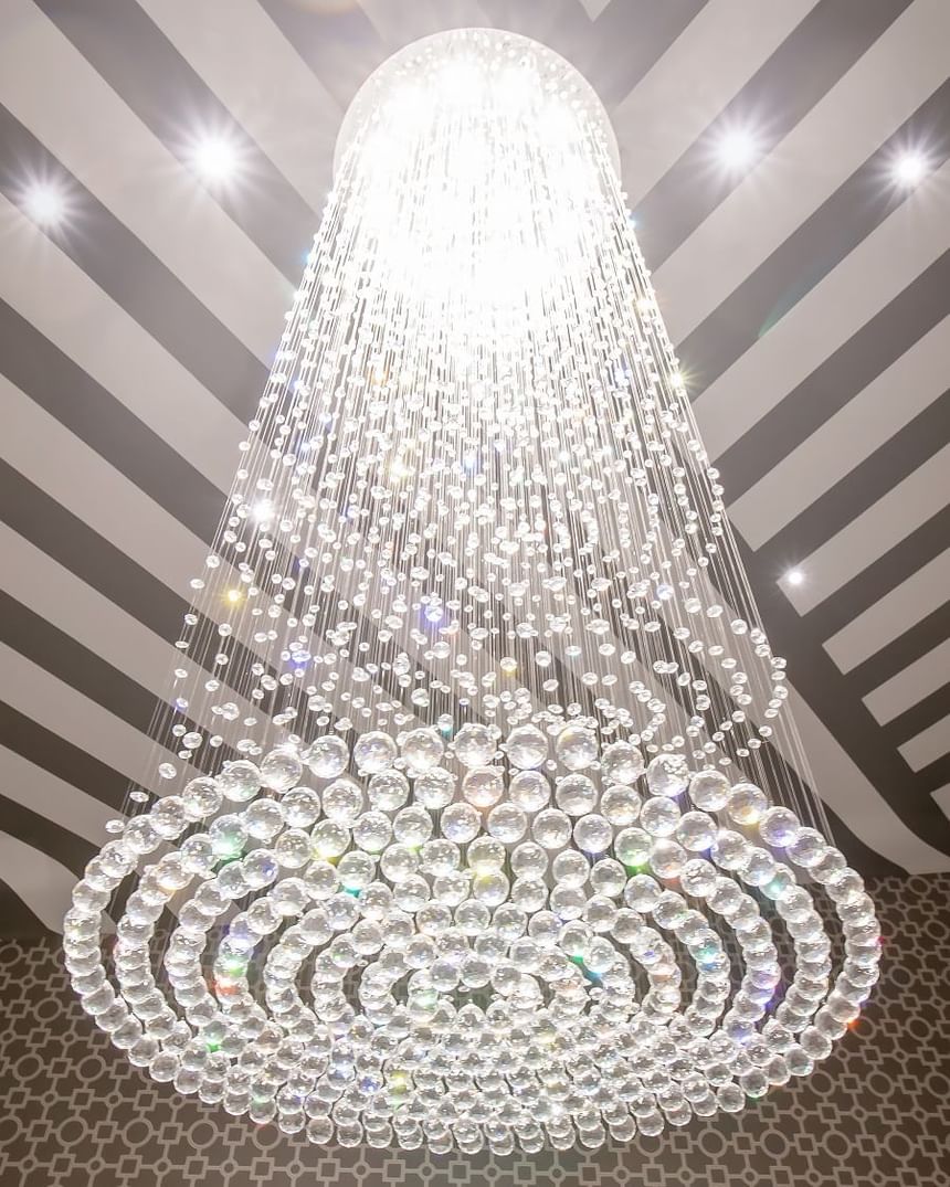 Swarovski chandelier with spiral rain drop crystals in Presidential suite at Retro Suites Hotel