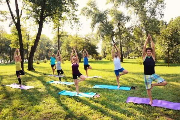 Yoga group fitness class a great team building activity to boost office morale 