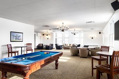 Poplar Lounge with multiple sitting areas, & a classic billiards table at Spencer Hotel & Conference Centre