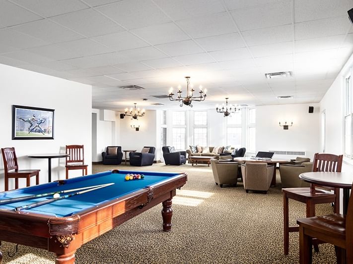 Poplar Lounge with multiple sitting areas, & a classic billiards table at Spencer Hotel & Conference Centre