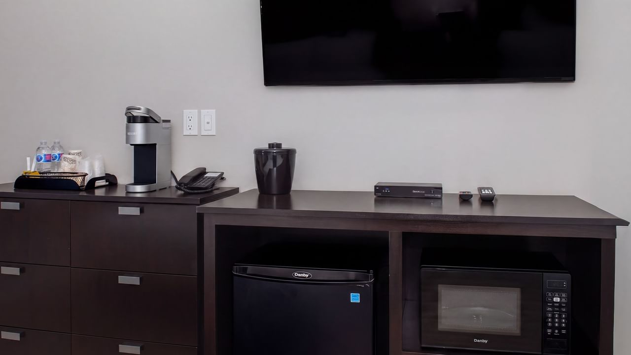 In-room coffee station, microwave and mini fridge at Coast Innisfail Hotel