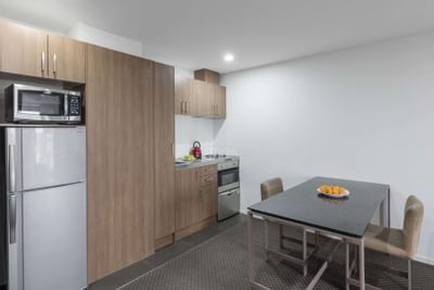 Kitchen & dining in 1-Bedroom Apartment at Nesuto St Martins