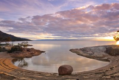 Landscape view of Honeymoon Bay at sunset near Freycinet Lodge