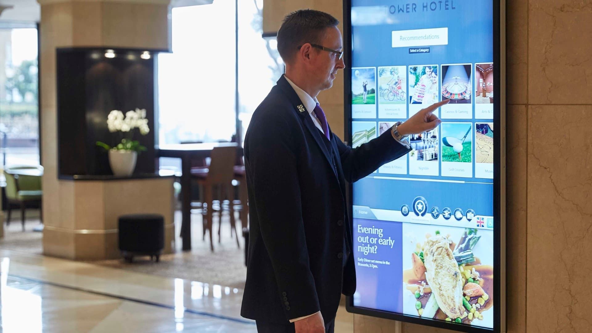 Concierge using digital kiosks at Guoman Hotels