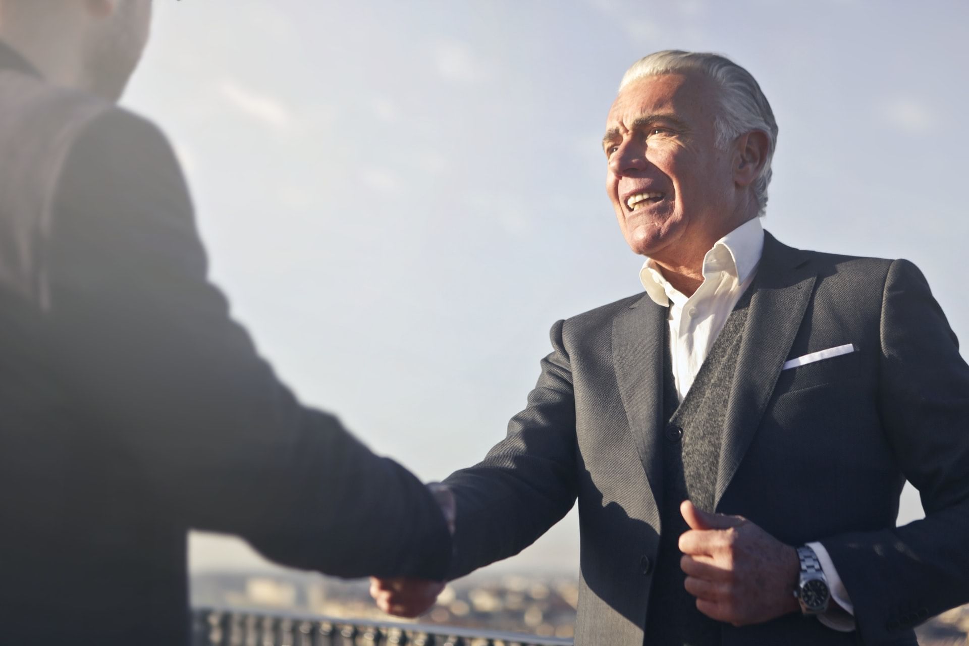 Closeup of Two people shaking hands at Hotel Maya Kuala Lumpur