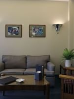 Senior Suite living area featuring a sofa with a coffee table at Warwick Palm Beach Hotel