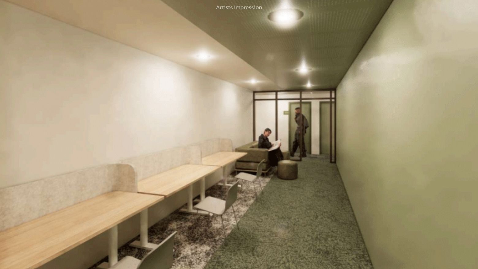 Interior view of a hallway with tables and seating at UniLodge Brisbane City.