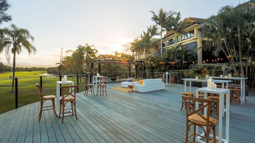 The Deck with sofas and chairs at Mercure Gold Coast Resort