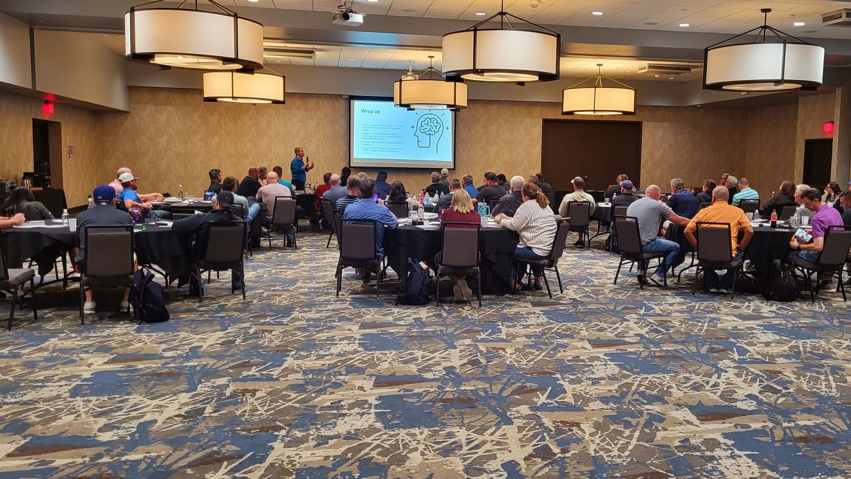 People attending a meeting held in Roosevelt Ballroom at Shangri-La Monkey Island