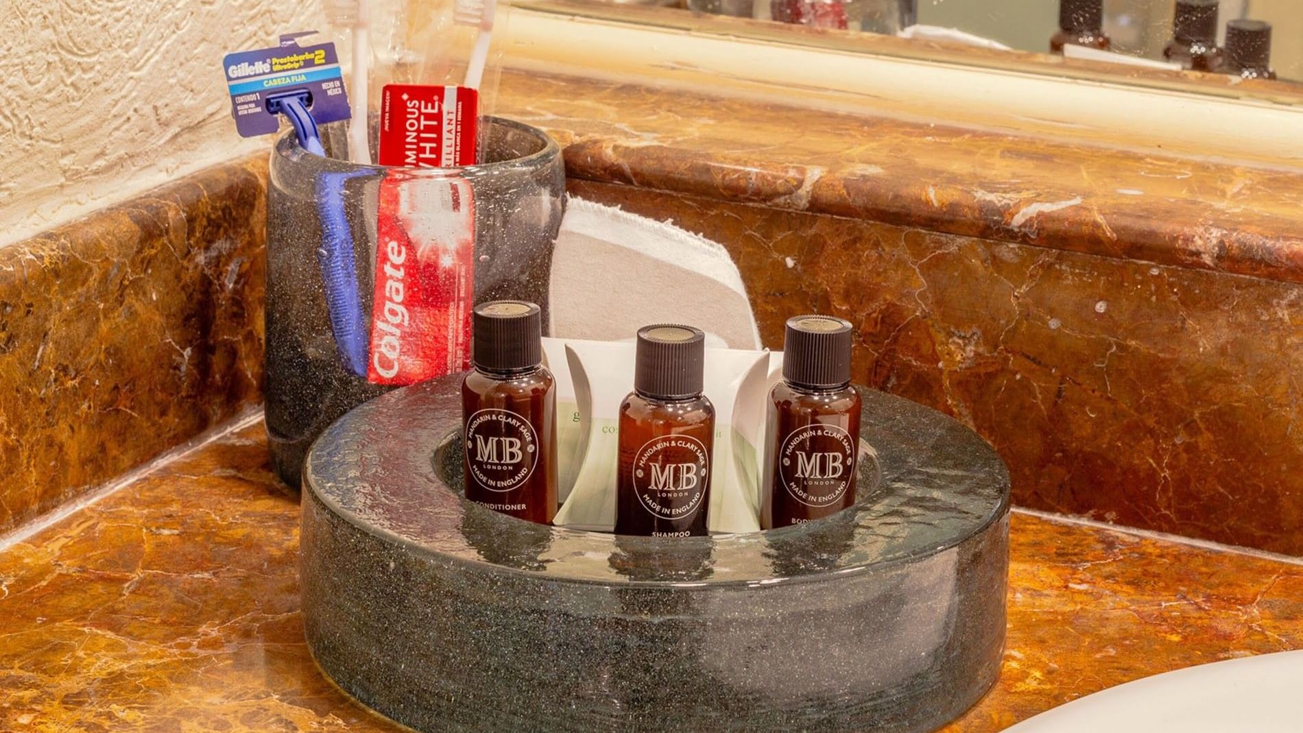 Close-up of bath amenities in 2 Double Camino Real Club displayed on a bathroom vanity at  Camino Real Puebla Angelopolis