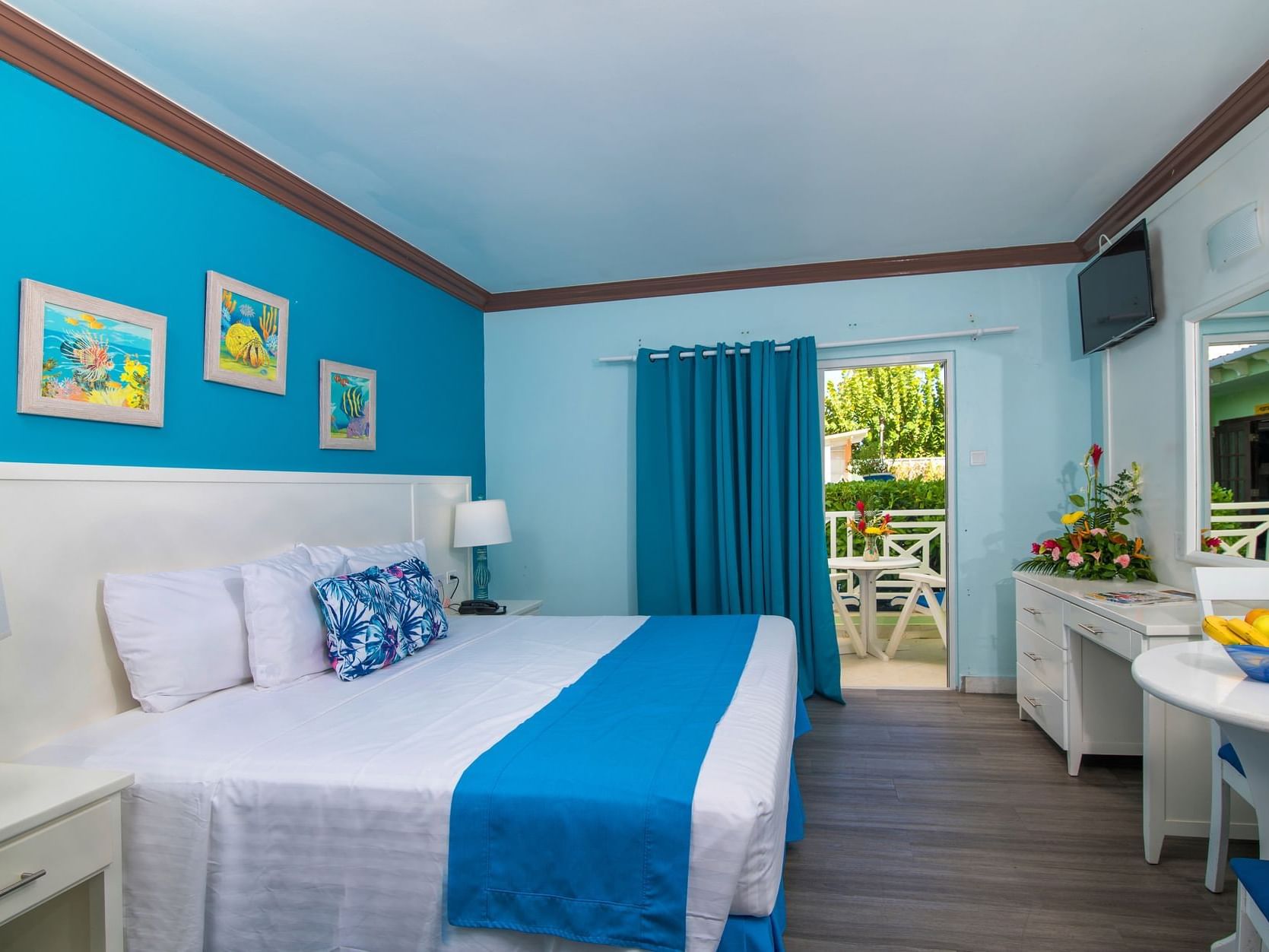 Comfy bed, mirror table with a patio in Studio Pool View at Dover Beach Hotel
