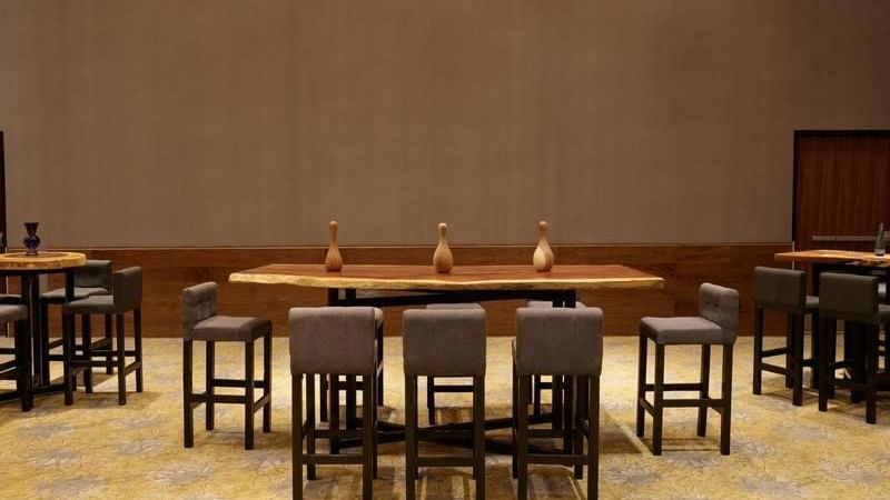 Banquet tables arranged for an event at FA Viaducto Aeropuerto 