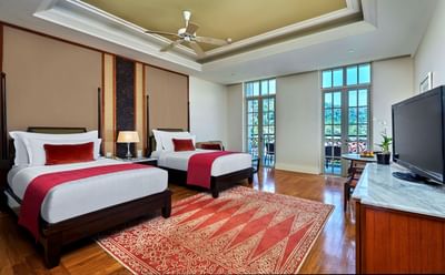 Merchant bedroom with two single beds at The Danna Langkawi