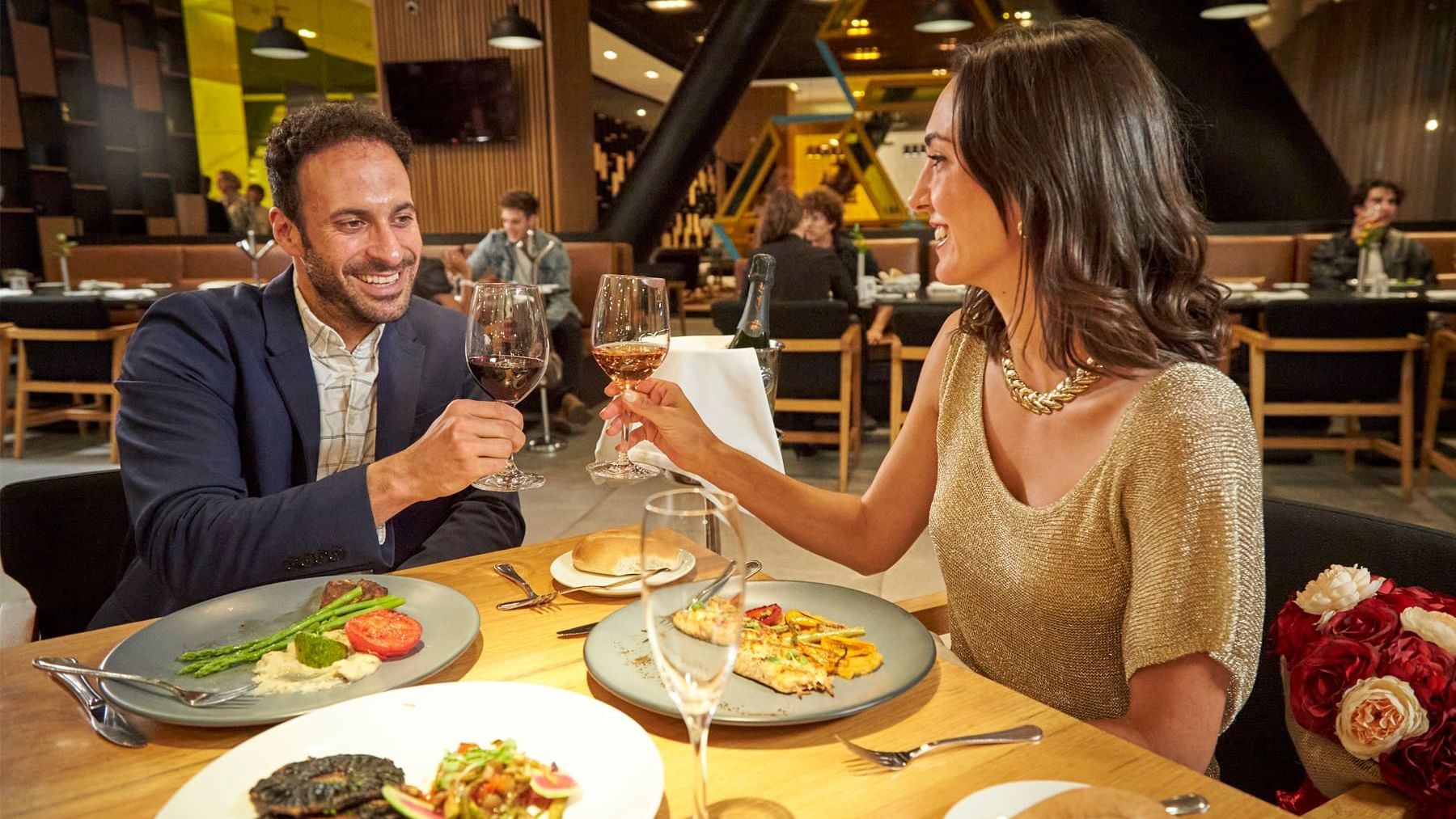 Couple enjoying a dinner together in a restaurant at Fiesta Americana