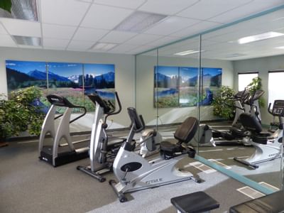 View of the gym at Sophie Station Suites