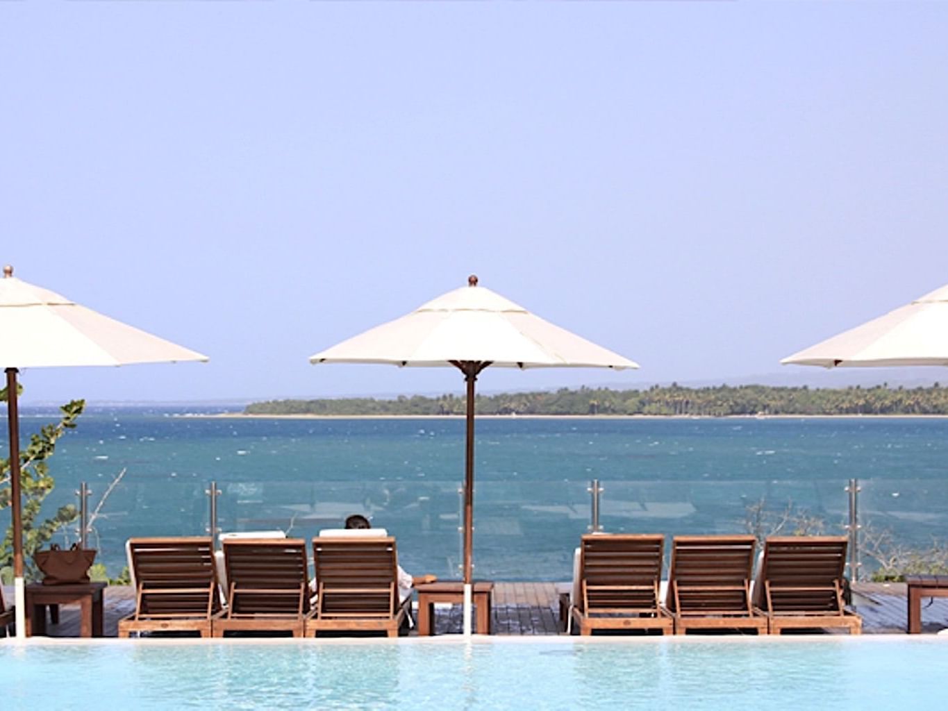 Sun Beds by the pool & beach at Casa Colonial Beach and Spa