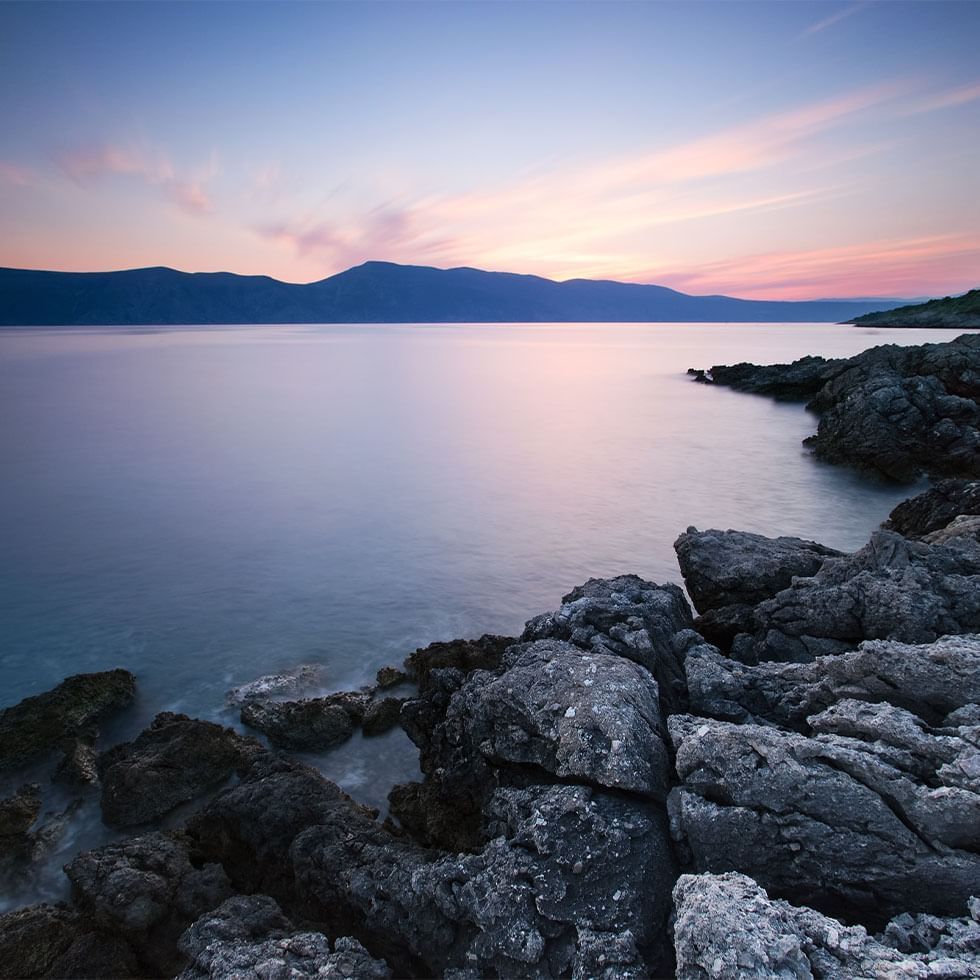 Tranquil seascape with pastel sky in Nature park near Falkensteiner Family Hotel Diadora