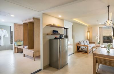 Mini refrigerator & sofa in Junior Suite at Eastin Ashta Resort Canggu