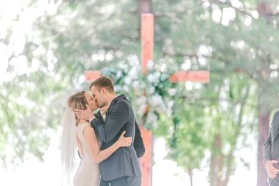 bride and groom kissing