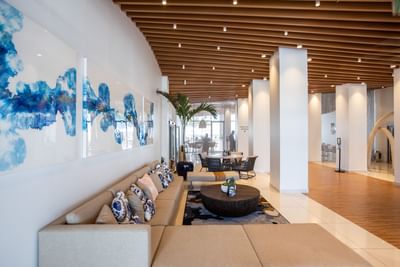 Lobby lounge area with sofas, The Morgan Resort Spa Village