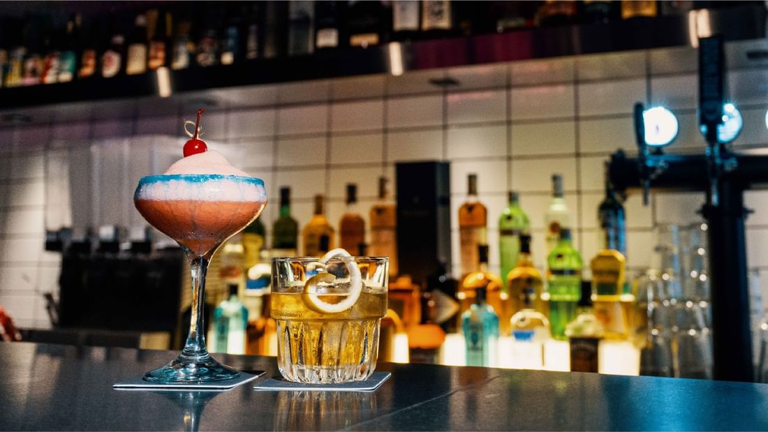 Cocktails served on a bar counter in Gordon Ramsay Bar & Grill at Sunway Hotels & Resorts