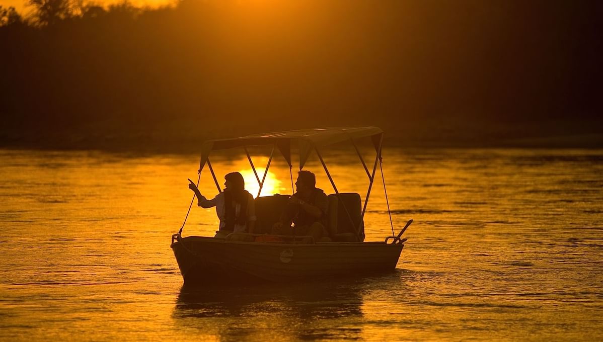 Tourists on a boat experience near Serena Mivumo River Lodge