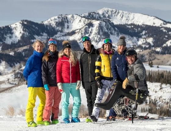 Members of Champion Program posing on a snowy plain near Chateaux Deer Valley