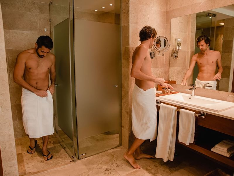 Men in the bathroom in Okom spa at The Reef 28