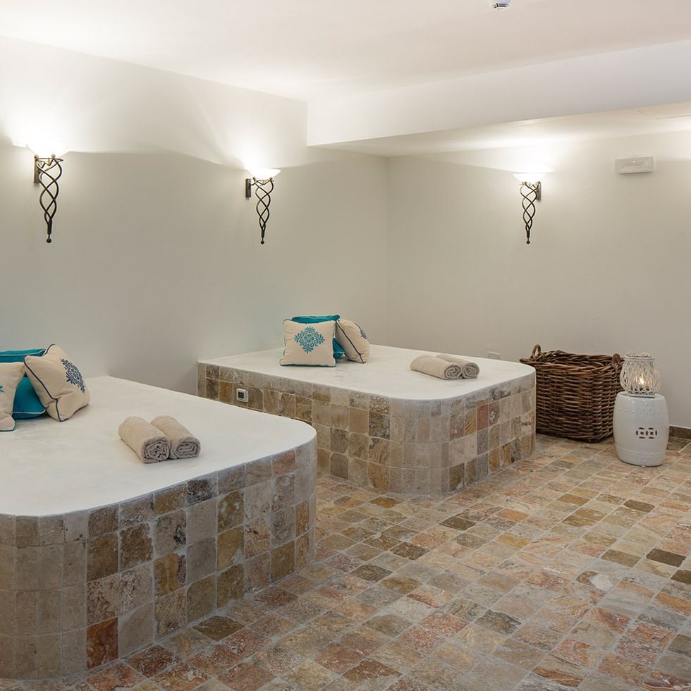 Interior of a Sauna with massage beds at Falkensteiner Hotels